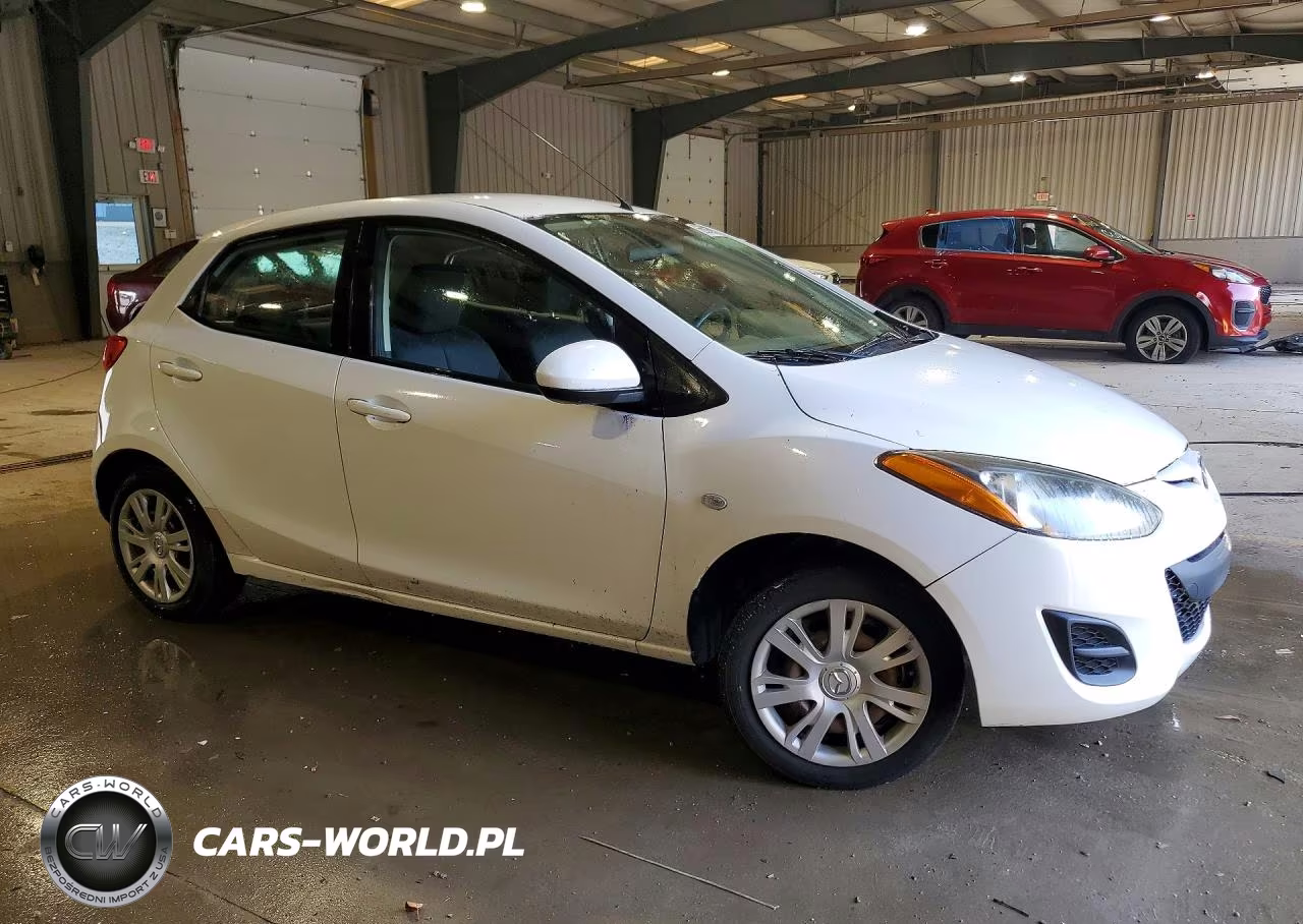 2011 Mazda Mazda2 VIN:JM1DE1HZ2B0130165 - 4