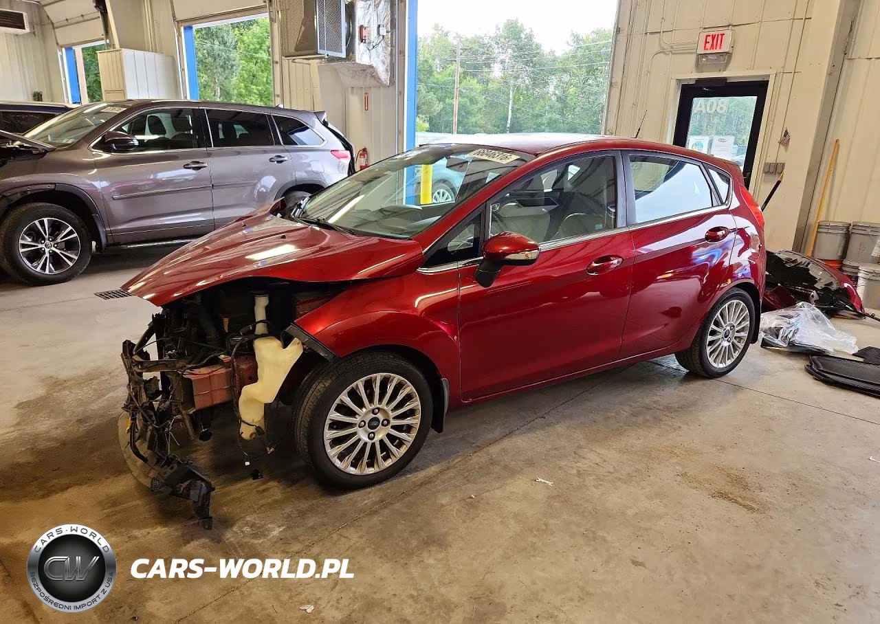 2014 Ford Fiesta Titanium VIN:3FADP4FJ7EM185940 - 1