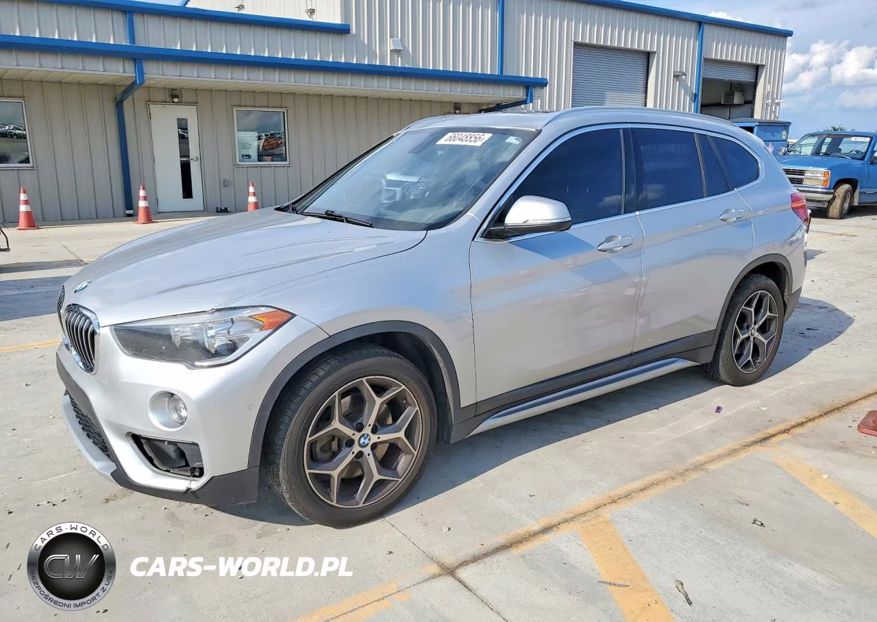 2018 BMW X1 VIN:WBXHU7C38J3H43856 - 1