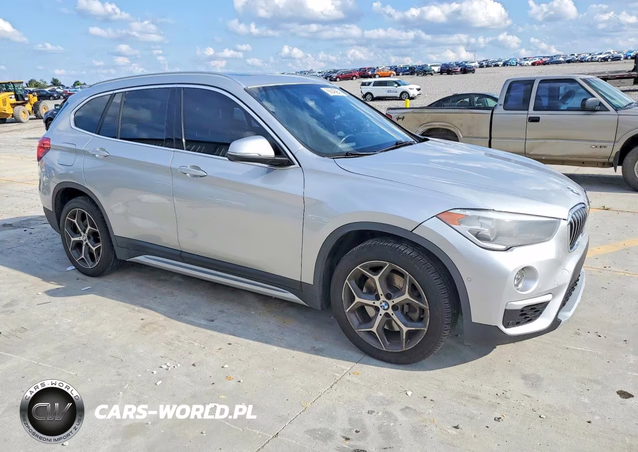 2018 BMW X1 VIN:WBXHU7C38J3H43856 - 4