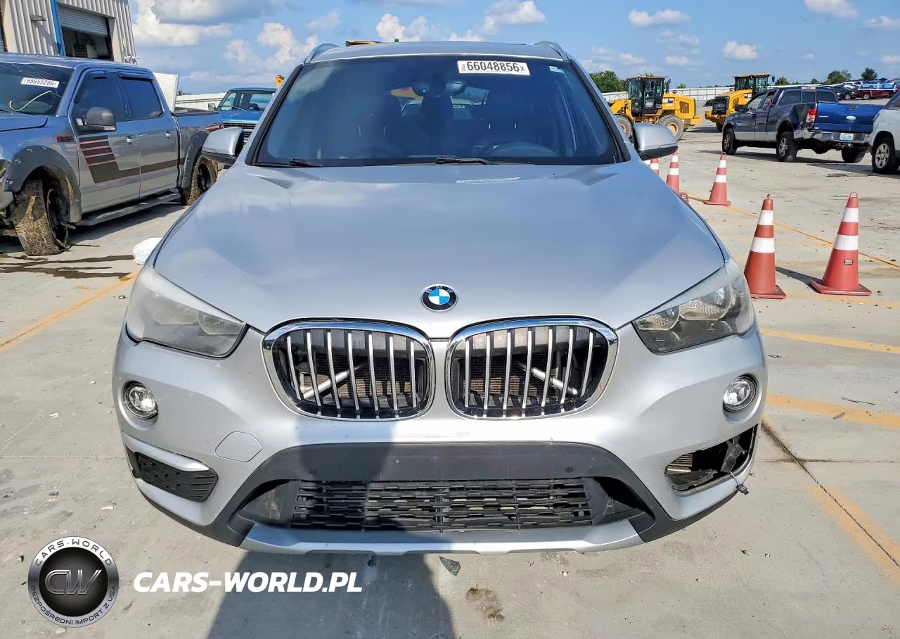 2018 BMW X1 VIN:WBXHU7C38J3H43856 - 5