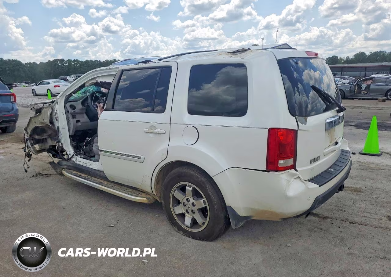 2011 Honda Pilot Touring VIN:5FNYF3H97BB057449 - 2