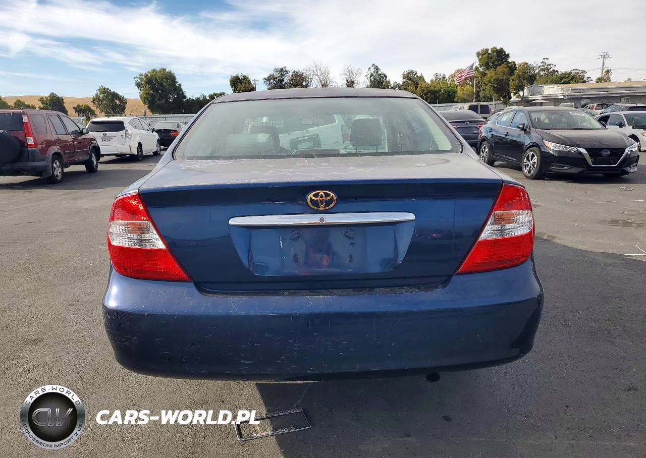 2002 Toyota Camry Le VIN:JTDBE32K020096063 - 6
