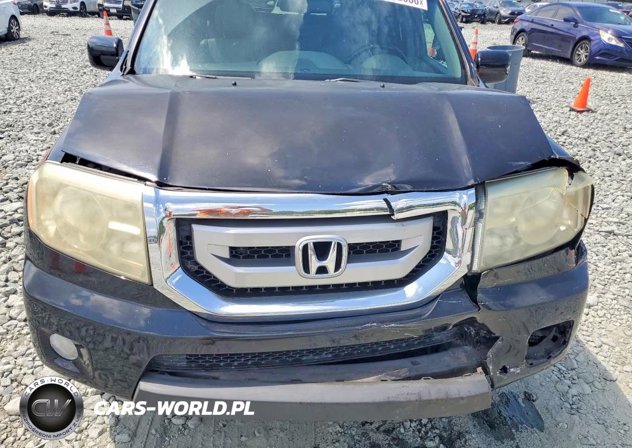 2011 Honda Pilot Touring VIN:5FNYF4H90BB055614 - 12