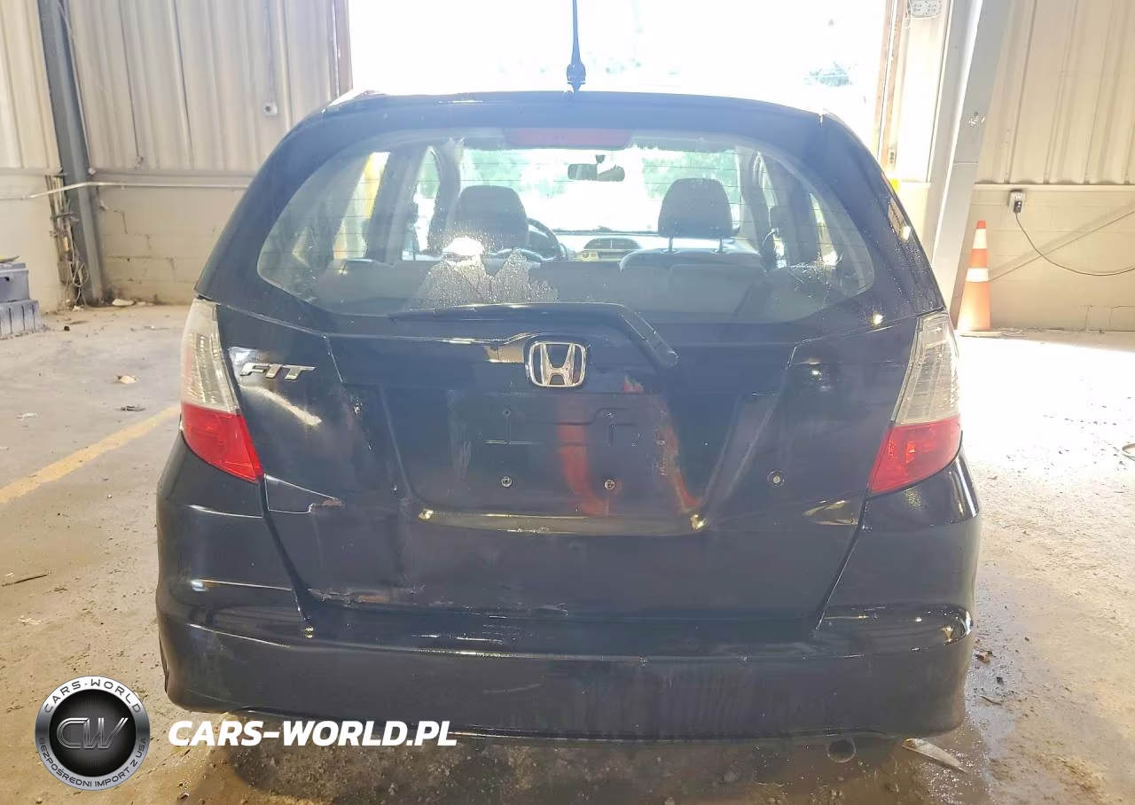 2010 Honda Fit VIN:JHMGE8H28AC011668 - 6