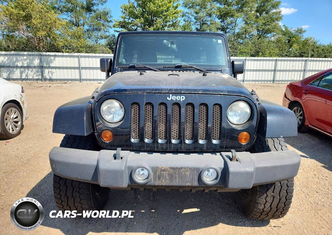 2011 Jeep Wrangler Unlimited Sahara VIN:1J4BA5H18BL588211 - 5