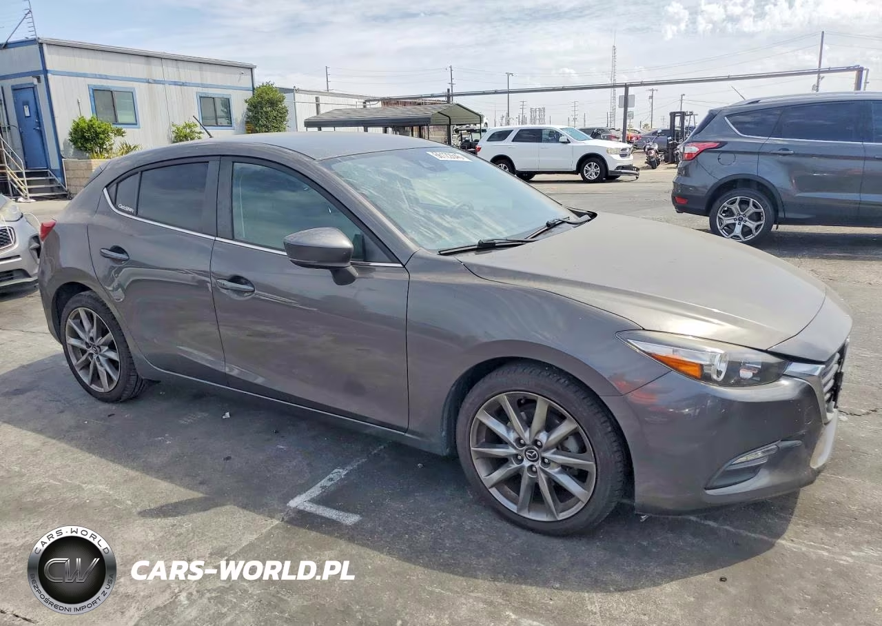 2018 Mazda 3 Touring VIN:3MZBN1L32JM176484 - 4