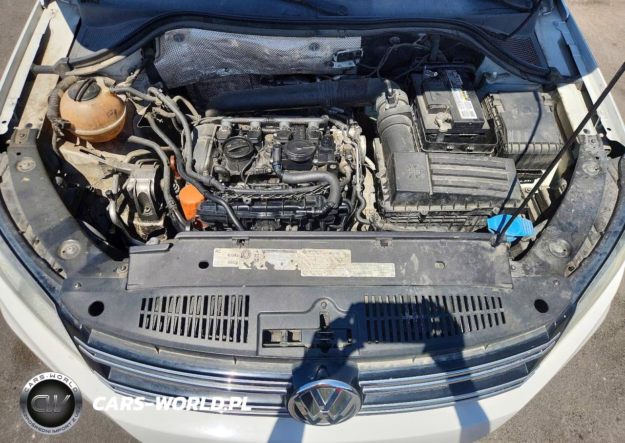 2012 Volkswagen Tiguan S VIN:WVGAV7AX2CW584795 - 11