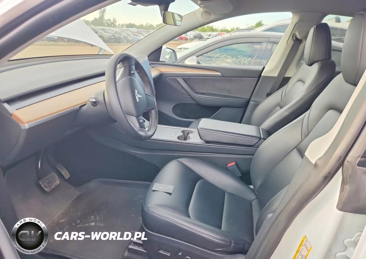 2023 Tesla Model Y VIN:7SAYGDEE8PA107562 - 7