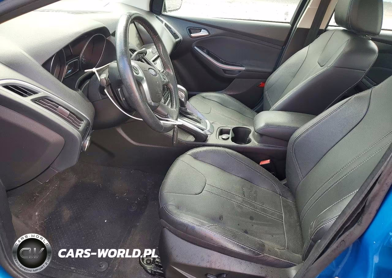 2012 Ford Focus Titanium VIN:1FAHP3J2XCL390615 - 7