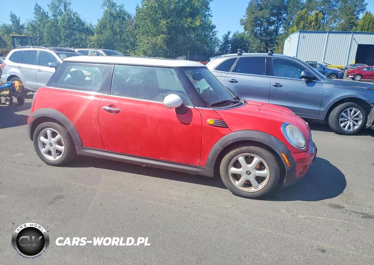 2010 Mini Cooper VIN:WMWMF3C59ATZ61699 - 4