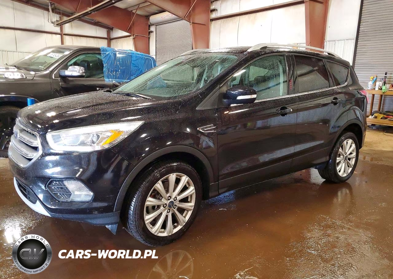 2017 Ford Escape Titanium VIN:1FMCU9J90HUE10252 - 1