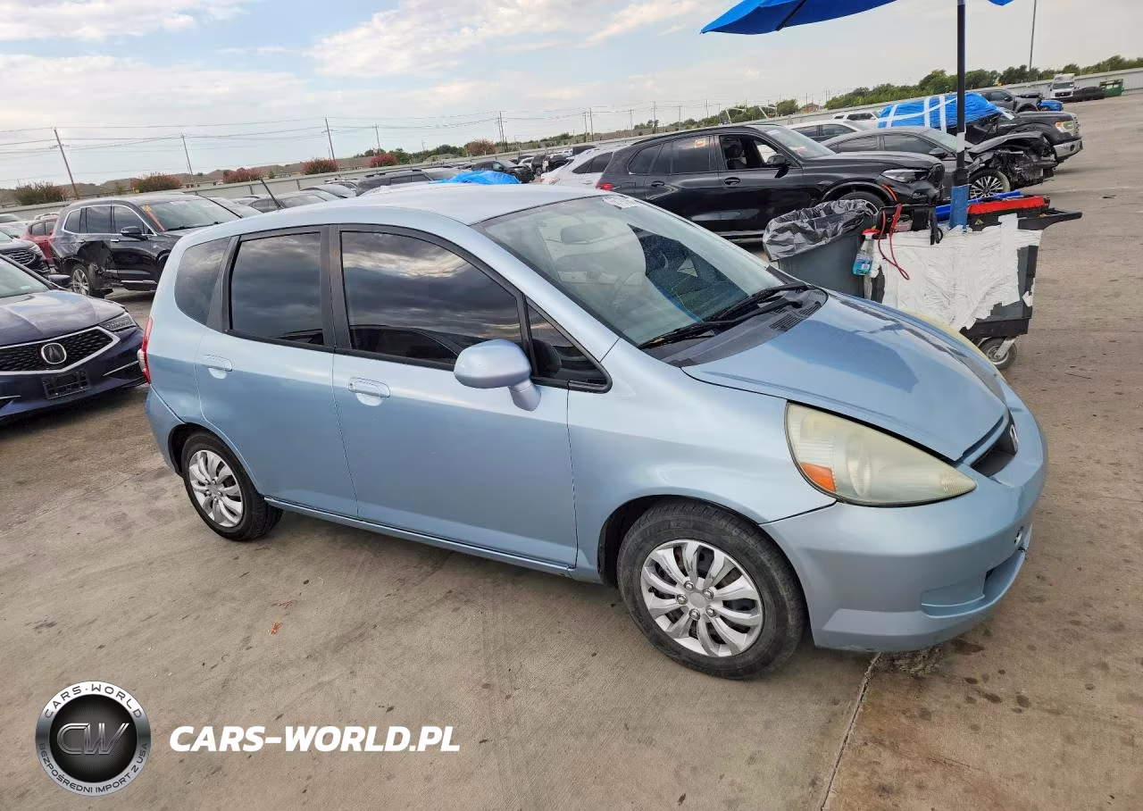 2007 Honda Fit VIN:JHMGD38457S014002 - 4