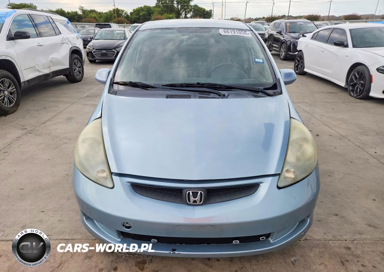 2007 Honda Fit VIN:JHMGD38457S014002 - 5