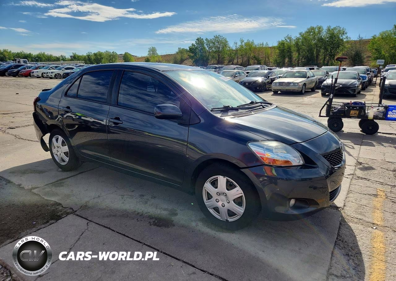 2009 Toyota Yaris Base VIN:JTDBT903X91352198 - 4