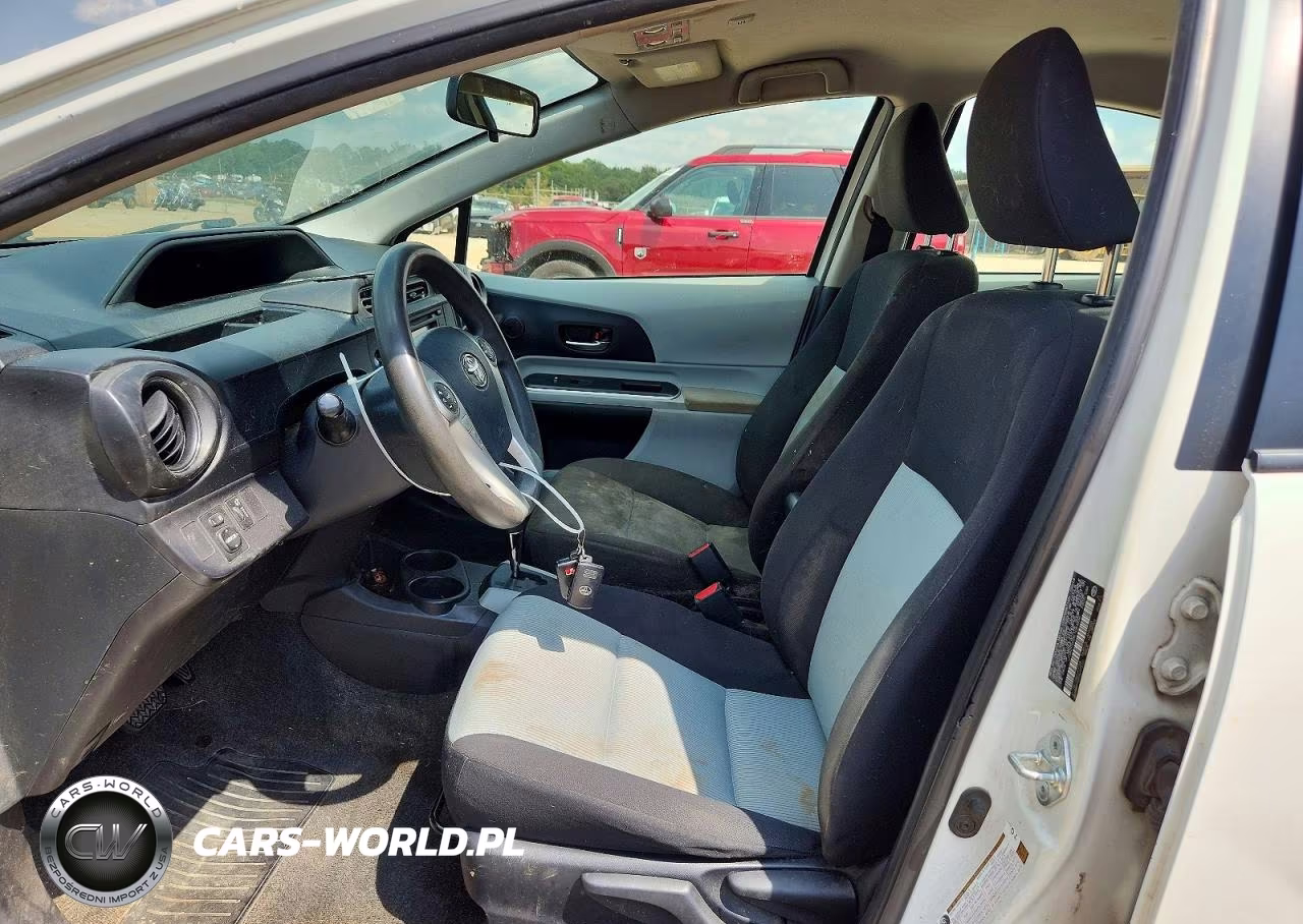 2014 Toyota Prius C Three VIN:JTDKDTB3XE1063436 - 7