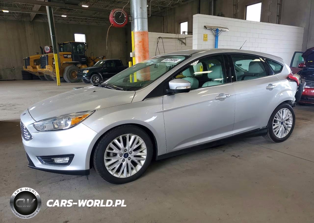 2016 Ford Focus Titanium VIN:1FADP3N20GL307465 - 1