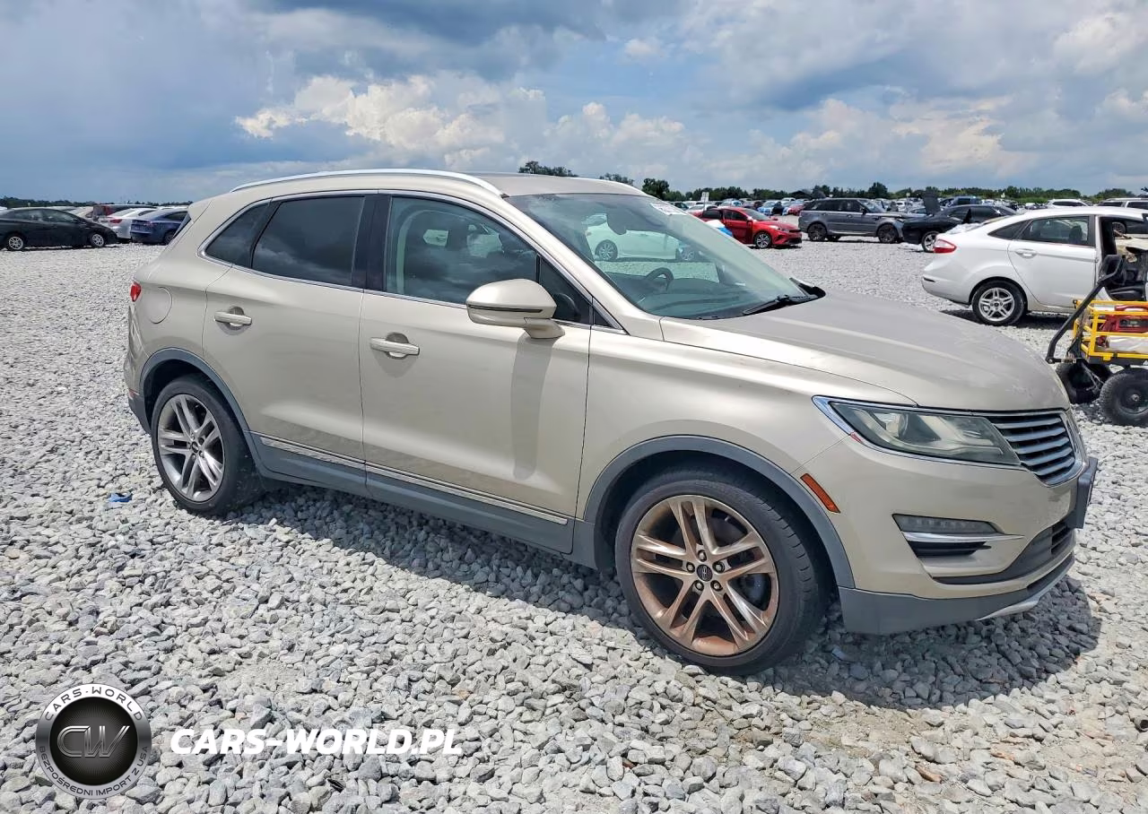 2015 Lincoln Mkc Premiere VIN:5LMTJ2AH0FUJ12656 - 4