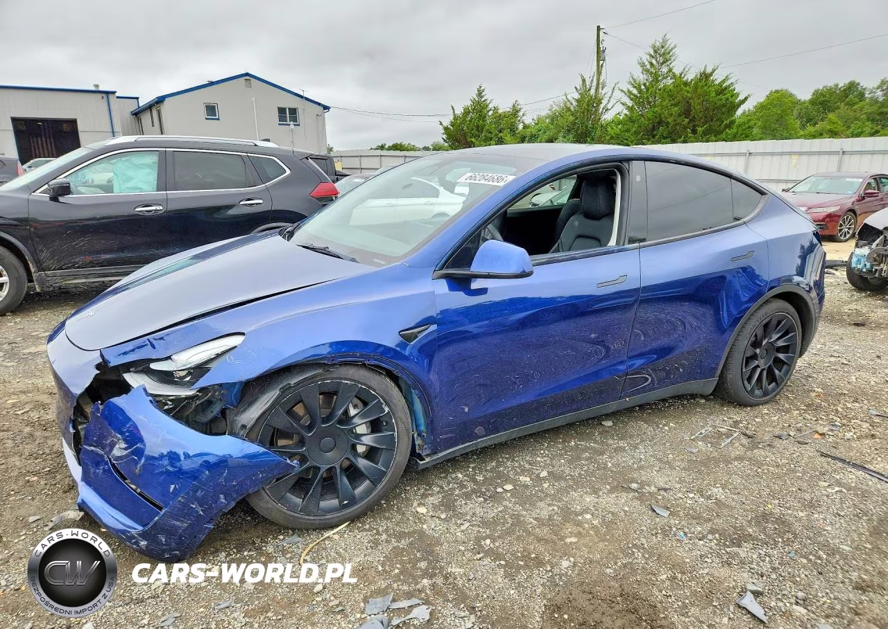 2023 Tesla Model Y VIN:7SAYGAEE3PF632482 - 1