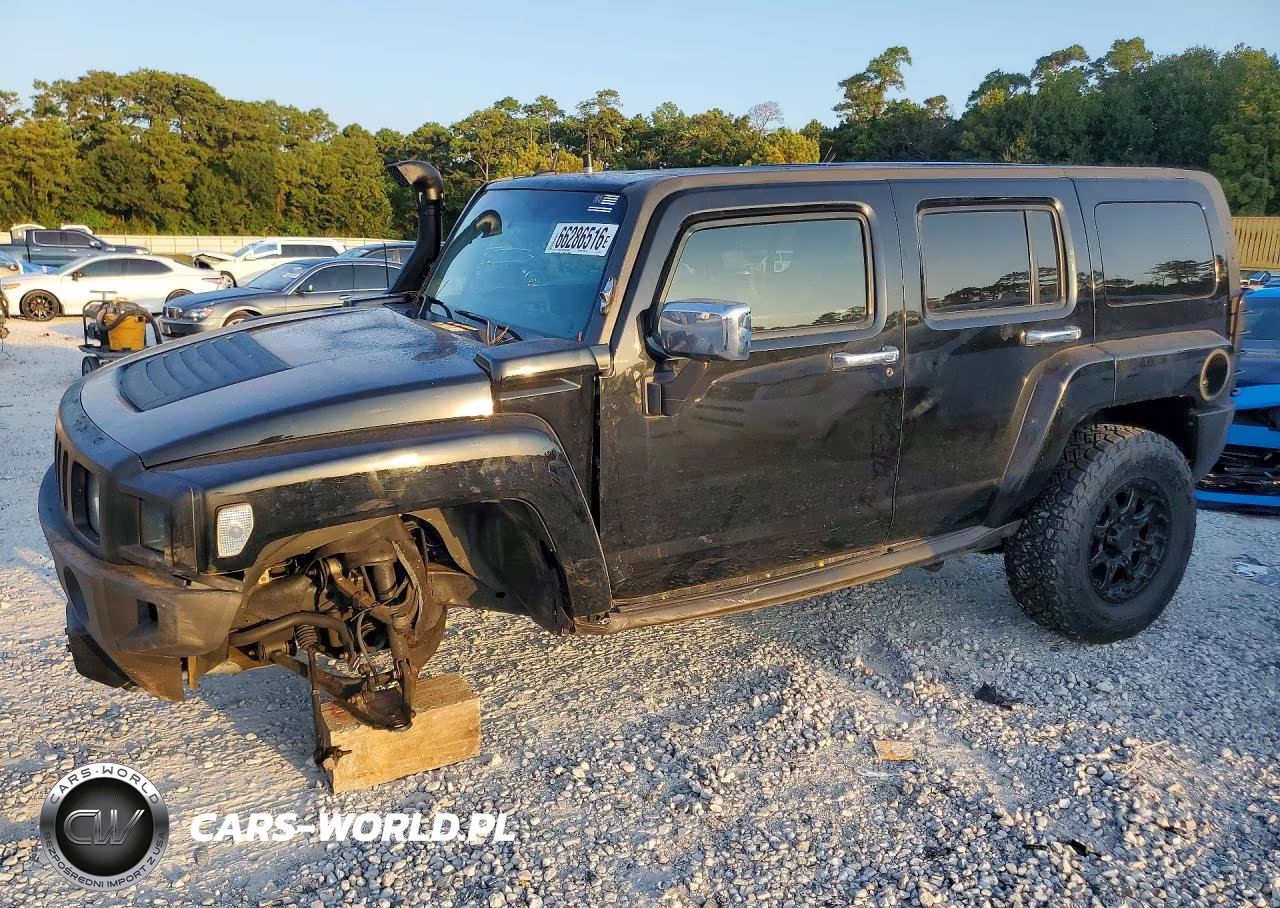 2009 Hummer H3 VIN:5GTEN13E398144895 - 1