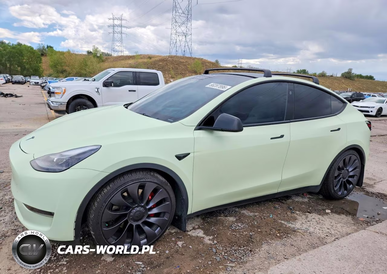 2023 Tesla Model Y VIN:7SAYGDEF8PF864716 - 1