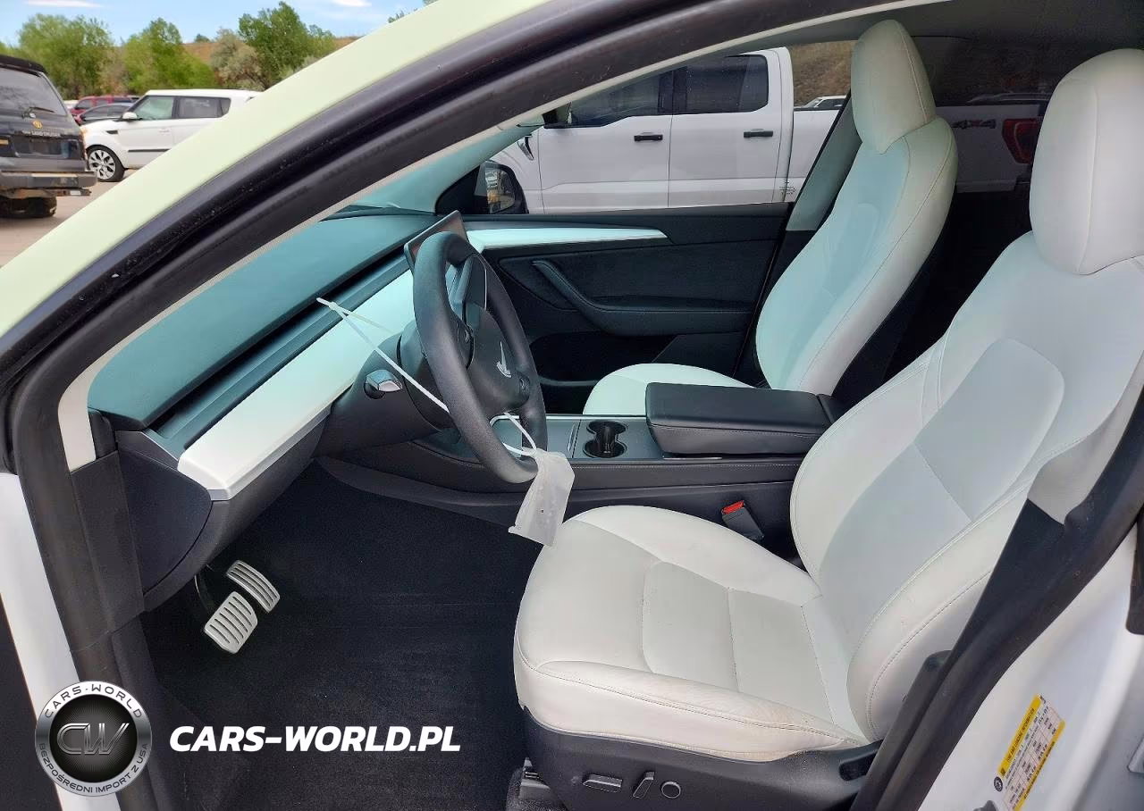 2023 Tesla Model Y VIN:7SAYGDEF8PF864716 - 7