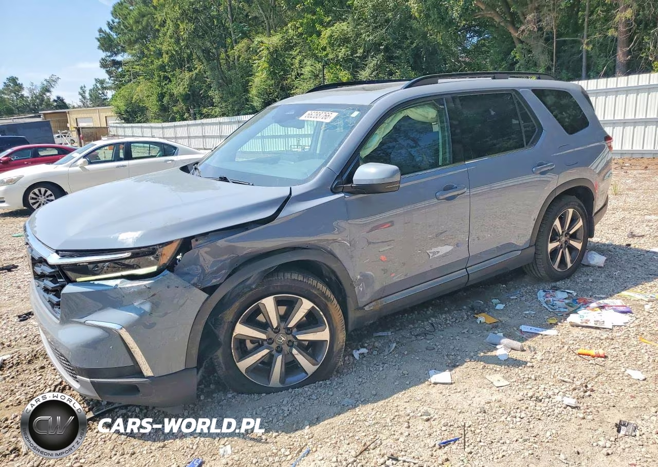 2023 Honda Pilot Touring VIN:5FNYG1H73PB030336 - 1