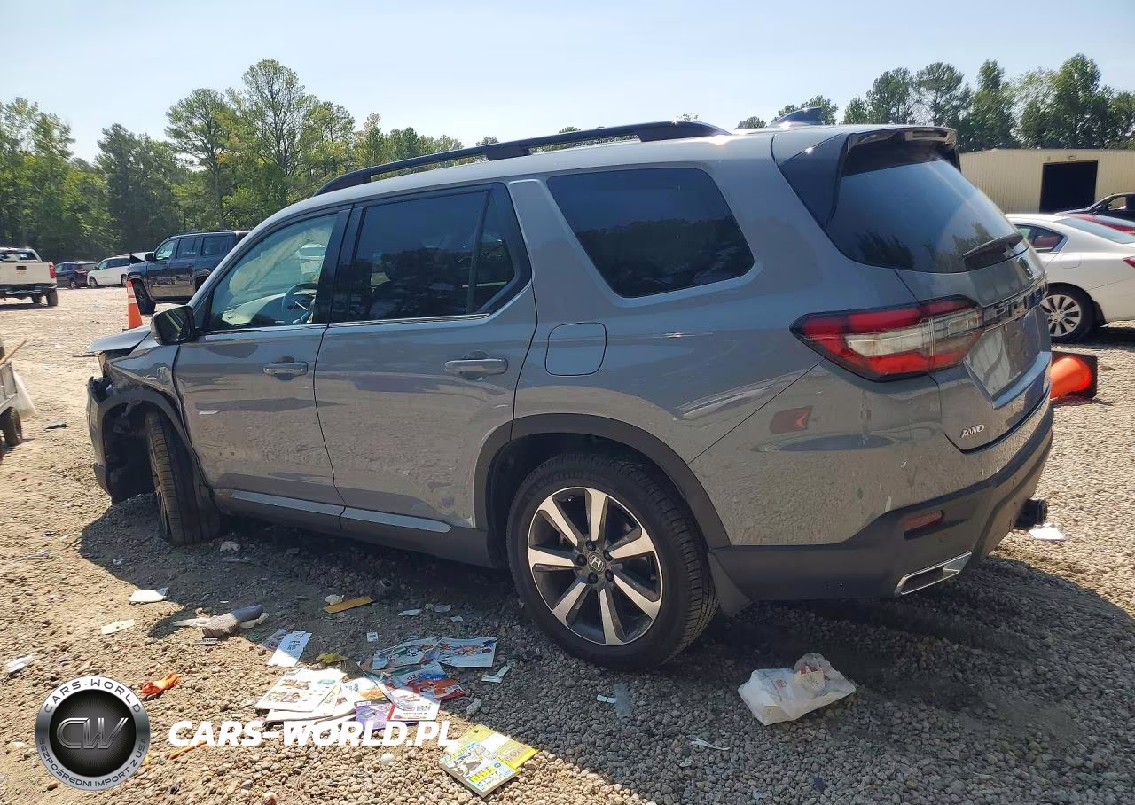 2023 Honda Pilot Touring VIN:5FNYG1H73PB030336 - 2