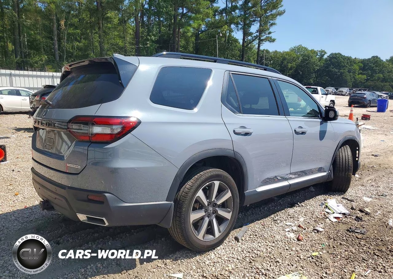 2023 Honda Pilot Touring VIN:5FNYG1H73PB030336 - 3