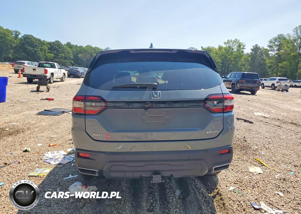 2023 Honda Pilot Touring VIN:5FNYG1H73PB030336 - 6