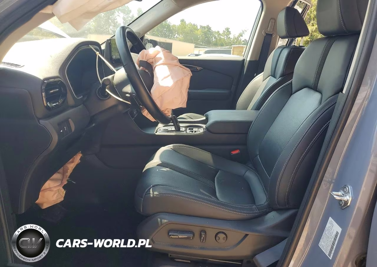 2023 Honda Pilot Touring VIN:5FNYG1H73PB030336 - 7