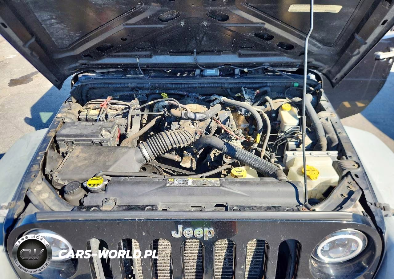 2011 Jeep Wrangler Sport VIN:1J4AA2D10BL628202 - 12