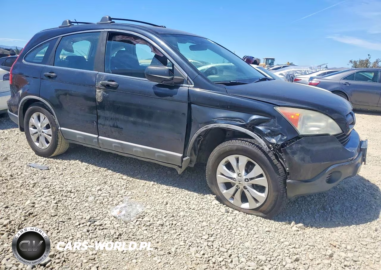 2009 Honda Cr-V Lx VIN:5J6RE38339L025800 - 4
