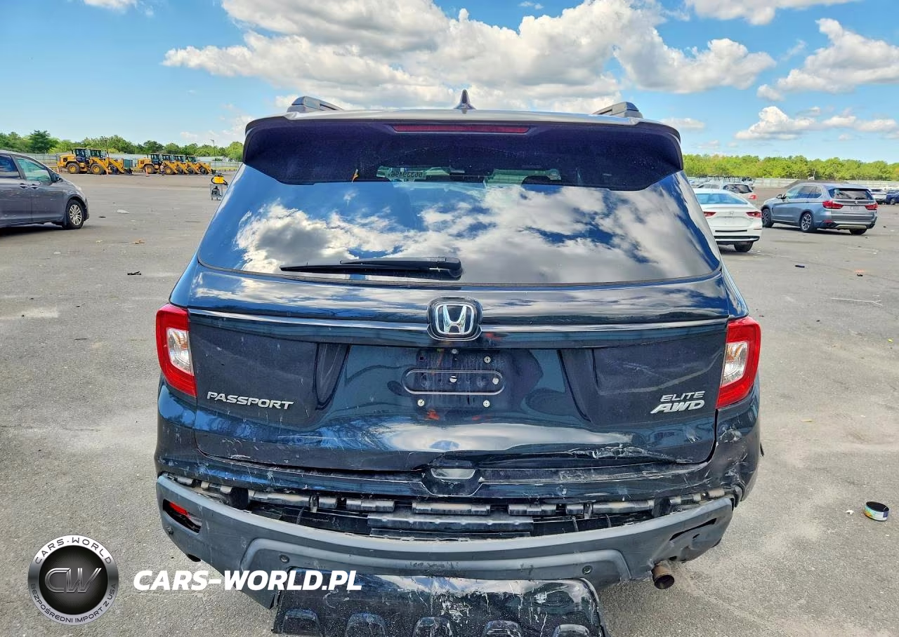 2019 Honda Passport Elite VIN:5FNYF8H06KB024179 - 6