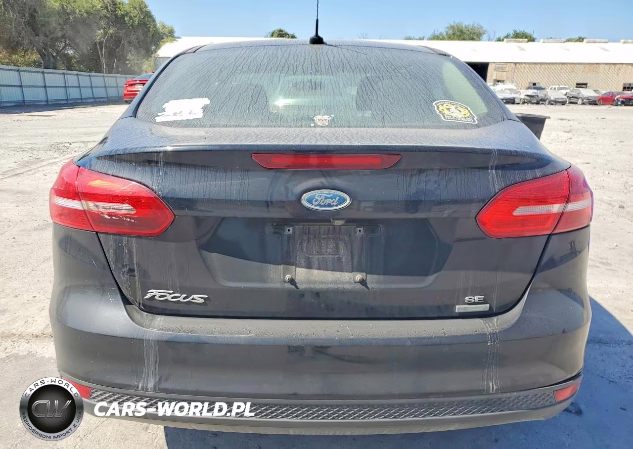 2018 Ford Focus Se VIN:1FADP3FEXJL244052 - 6