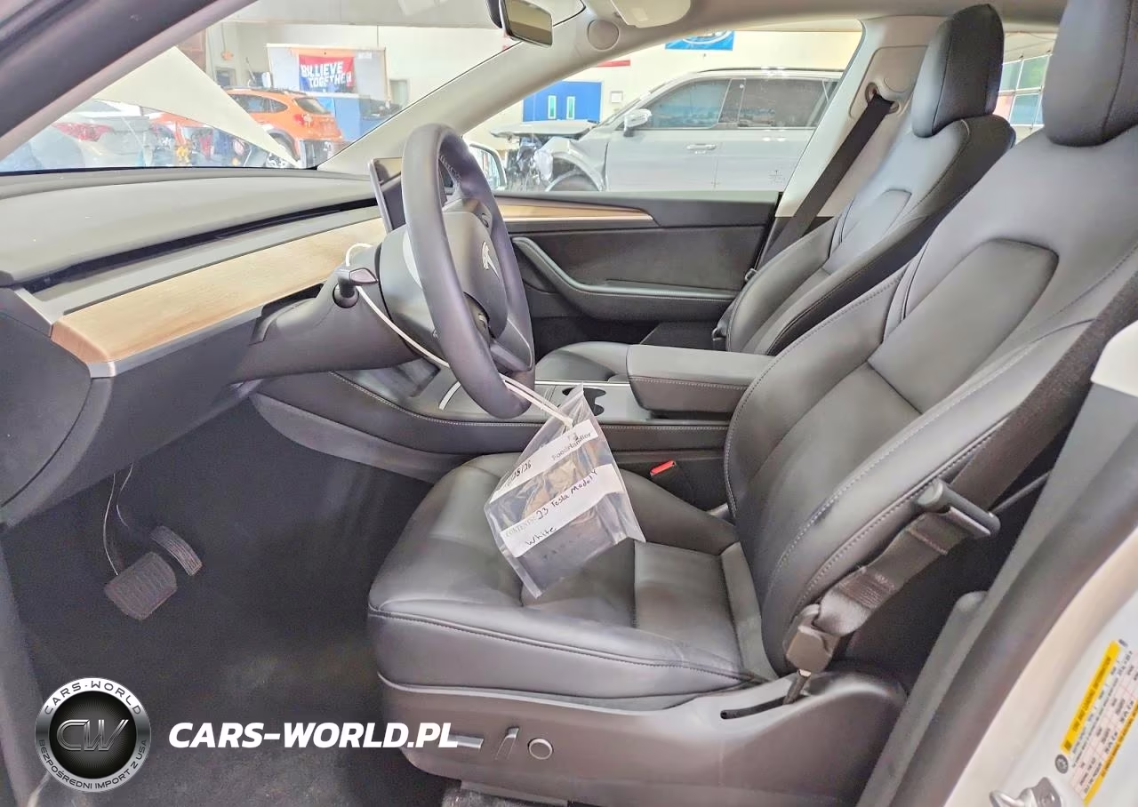 2023 Tesla Model Y VIN:7SAYGDEE7PF606971 - 7