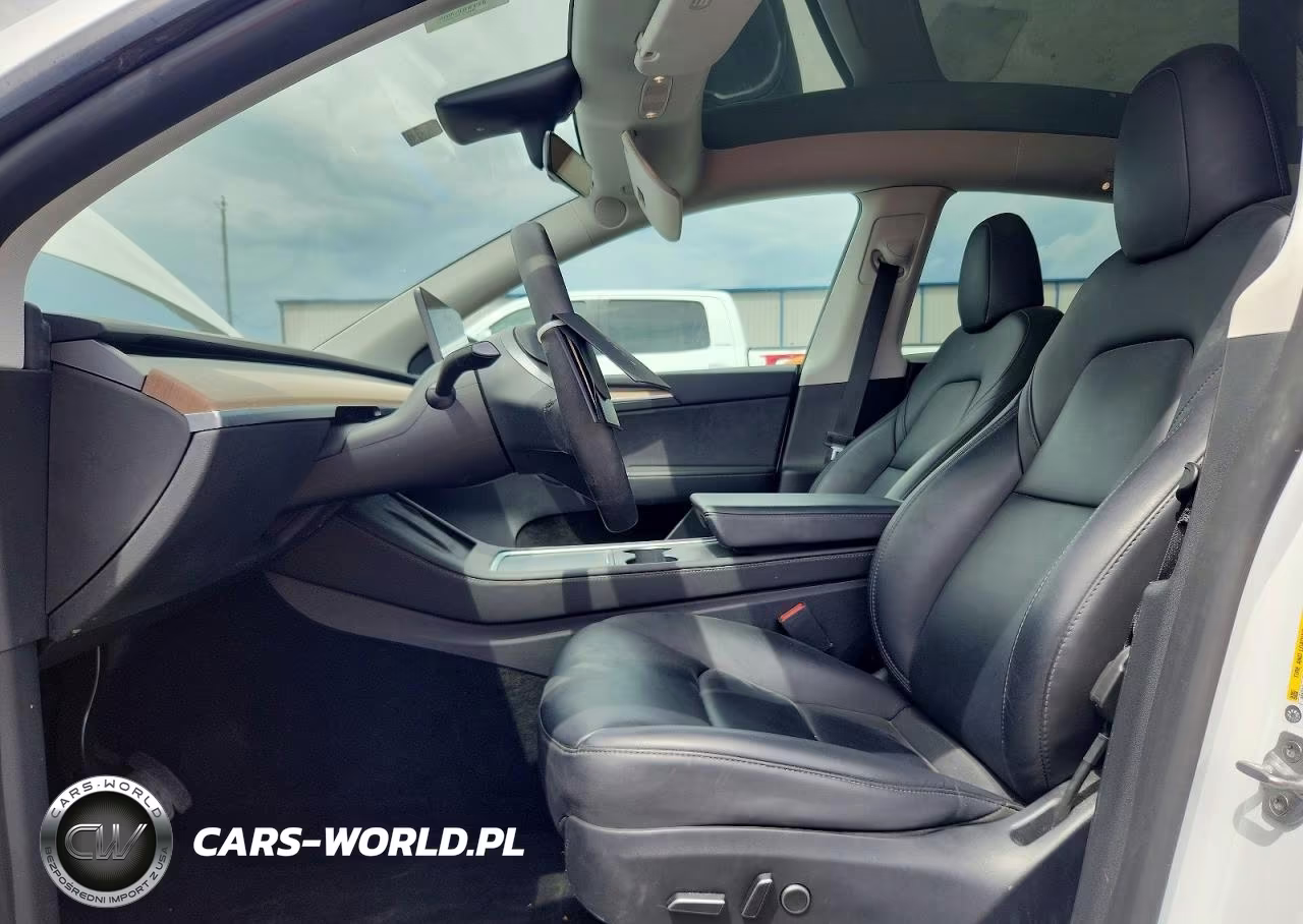 2023 Tesla Model Y VIN:7SAYGAEE1PF780520 - 7
