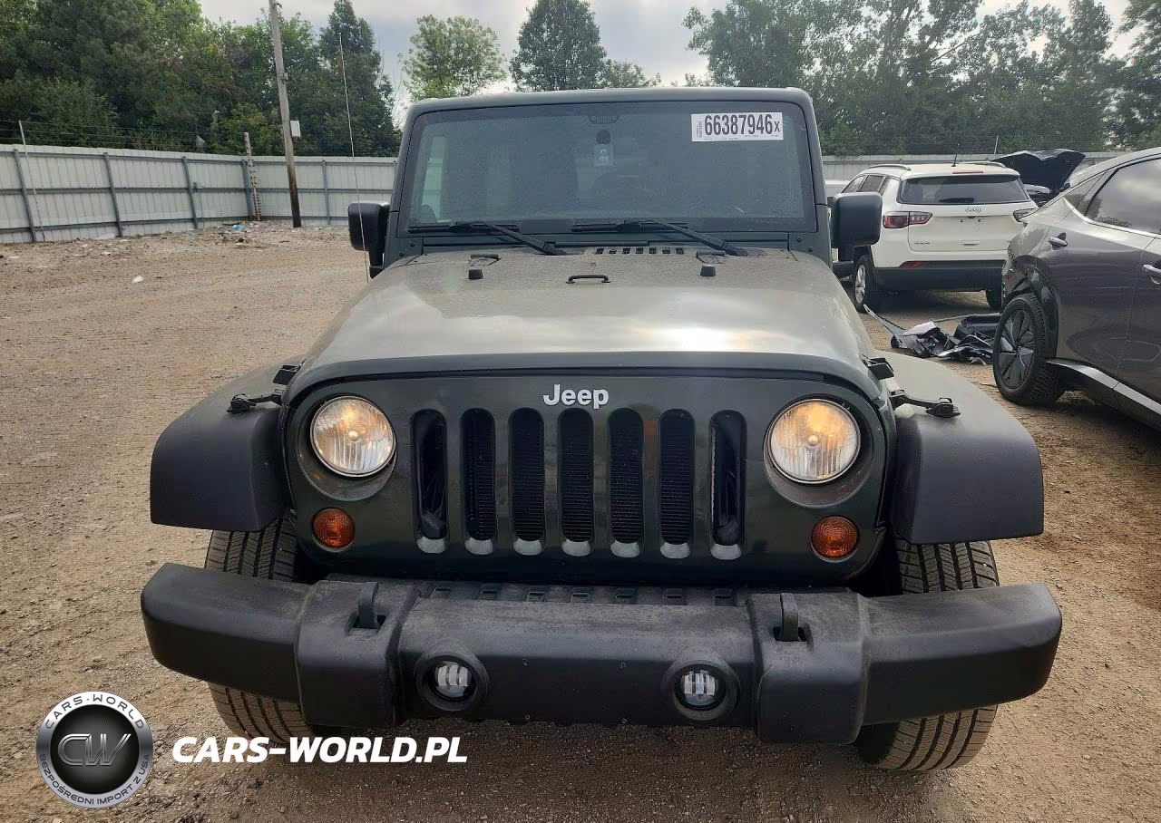 2011 Jeep Wrangler Unlimited Rubicon VIN:1J4HA6H15BL583001 - 5