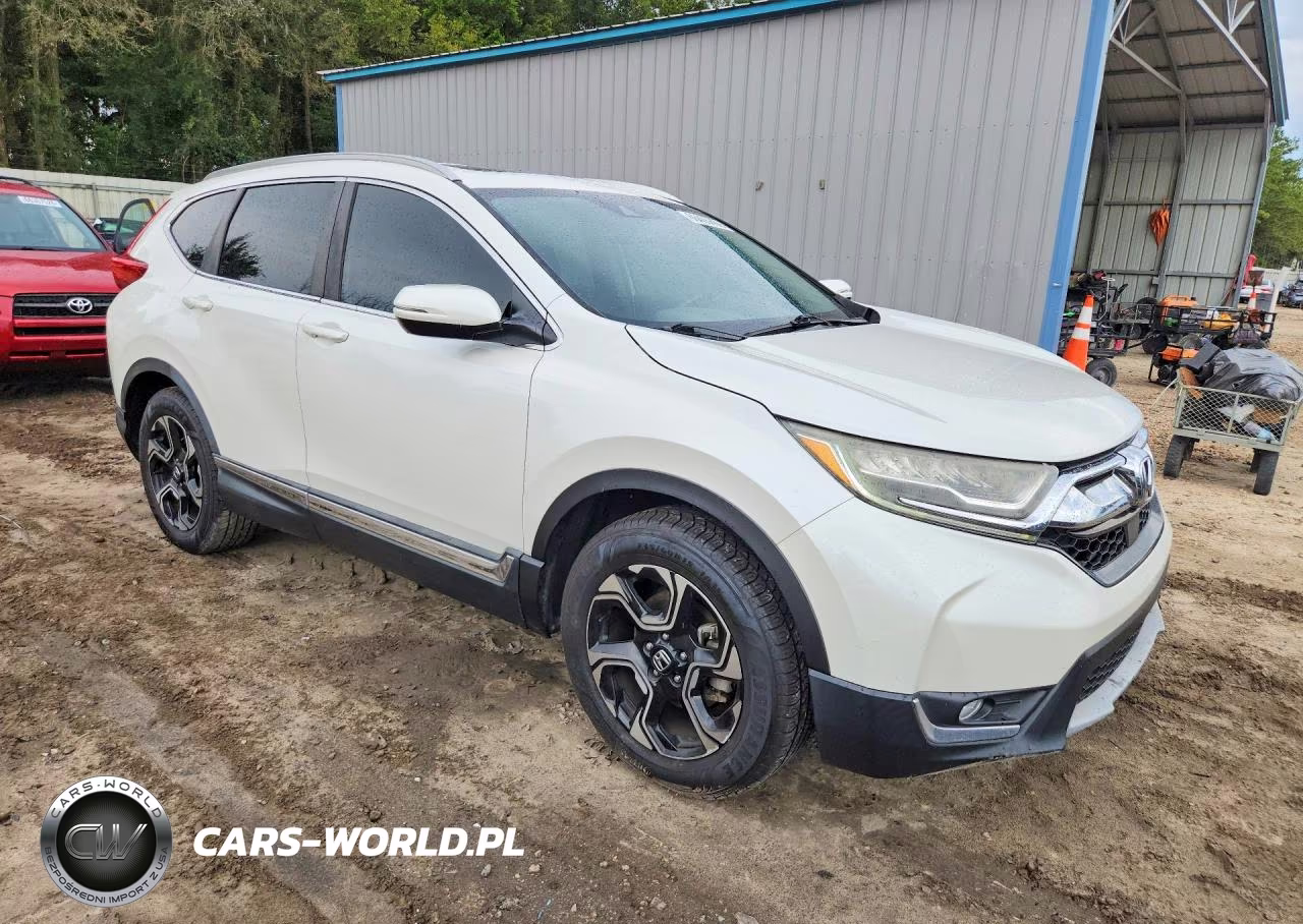 2017 Honda Cr-V Touring VIN:5J6RW1H99HL000243 - 4