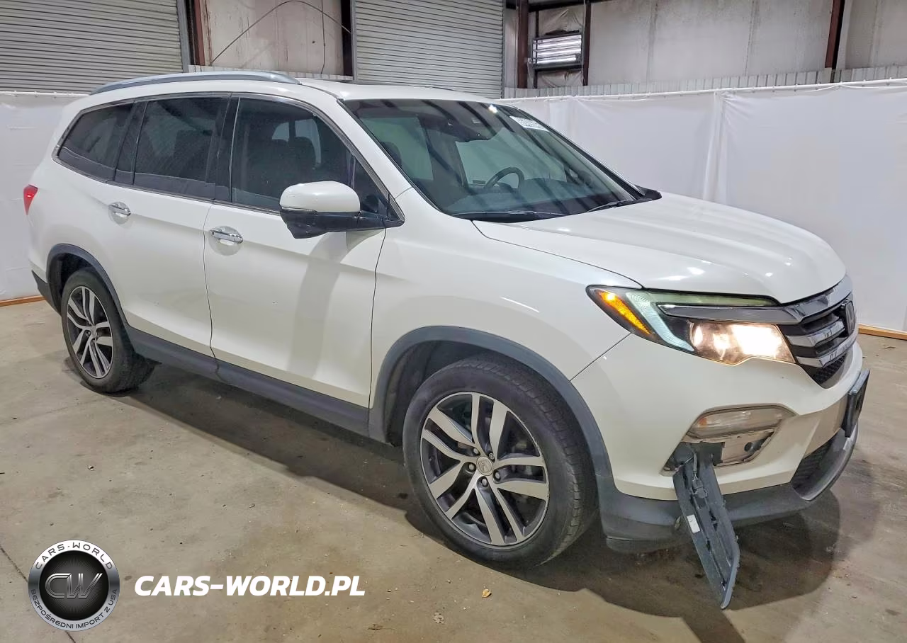 2018 Honda Pilot Touring VIN:5FNYF5H97JB002042 - 4