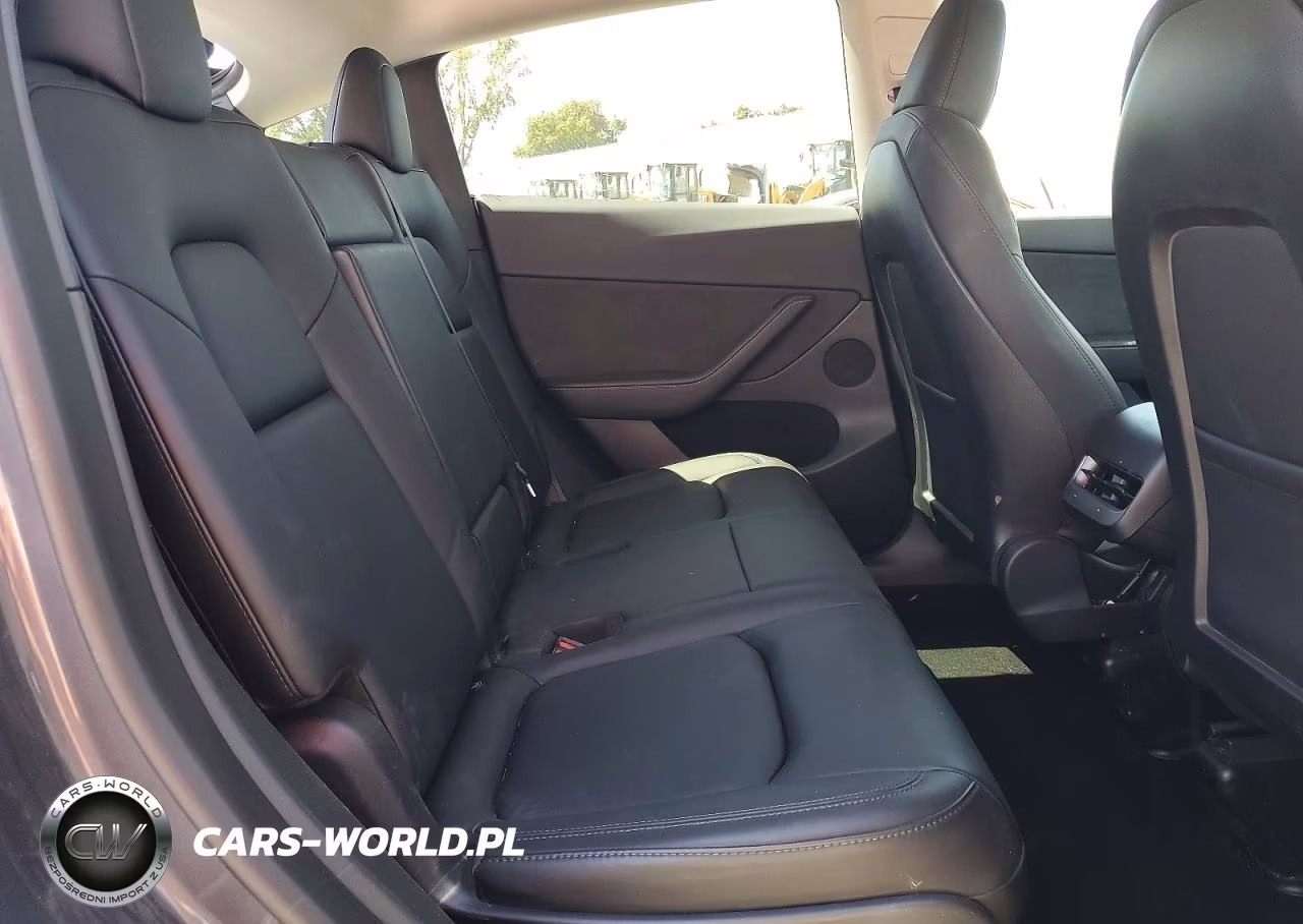 2023 Tesla Model Y VIN:7SAYGAEE0PF738551 - 10