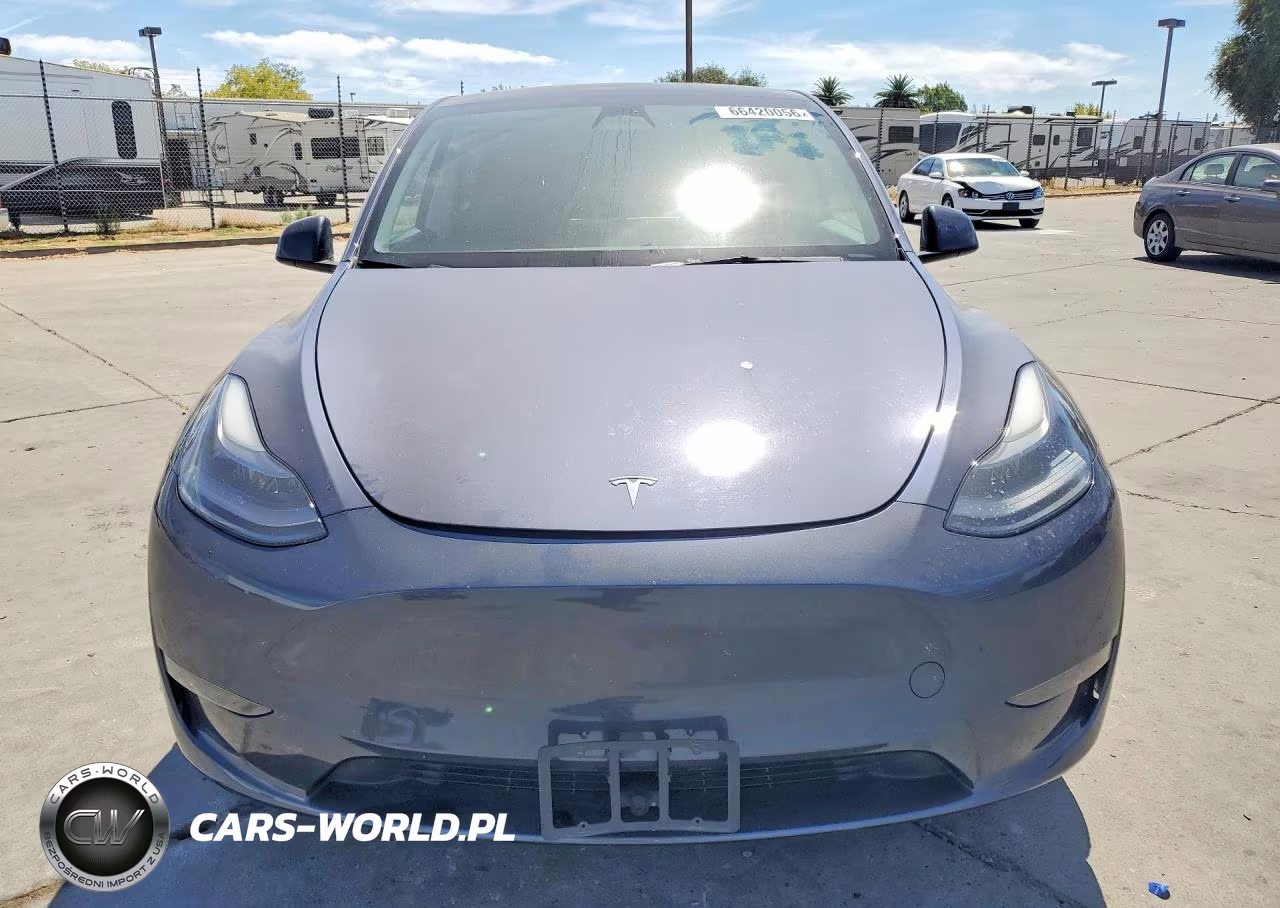 2023 Tesla Model Y VIN:7SAYGAEE0PF738551 - 5
