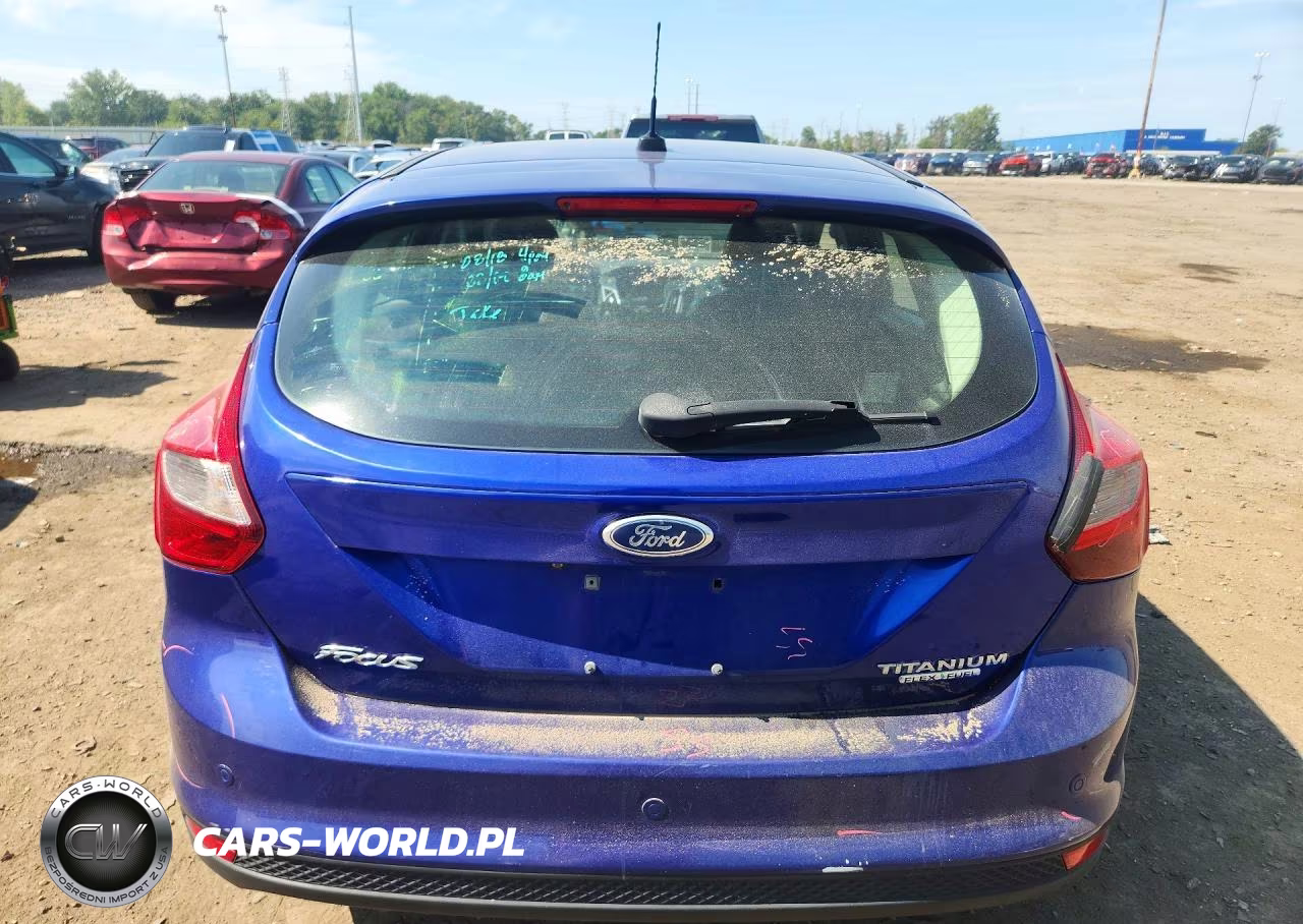 2013 Ford Focus Titanium VIN:1FADP3N2XDL327931 - 6