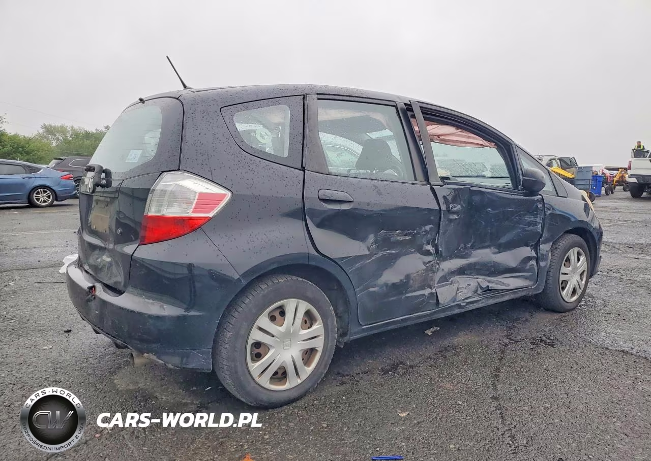 2009 Honda Fit VIN:JHMGE88239S013197 - 3
