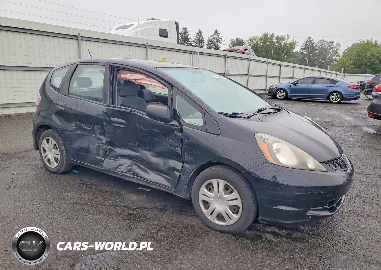 2009 Honda Fit VIN:JHMGE88239S013197 - 4