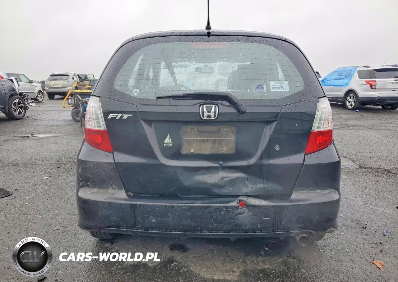2009 Honda Fit VIN:JHMGE88239S013197 - 6