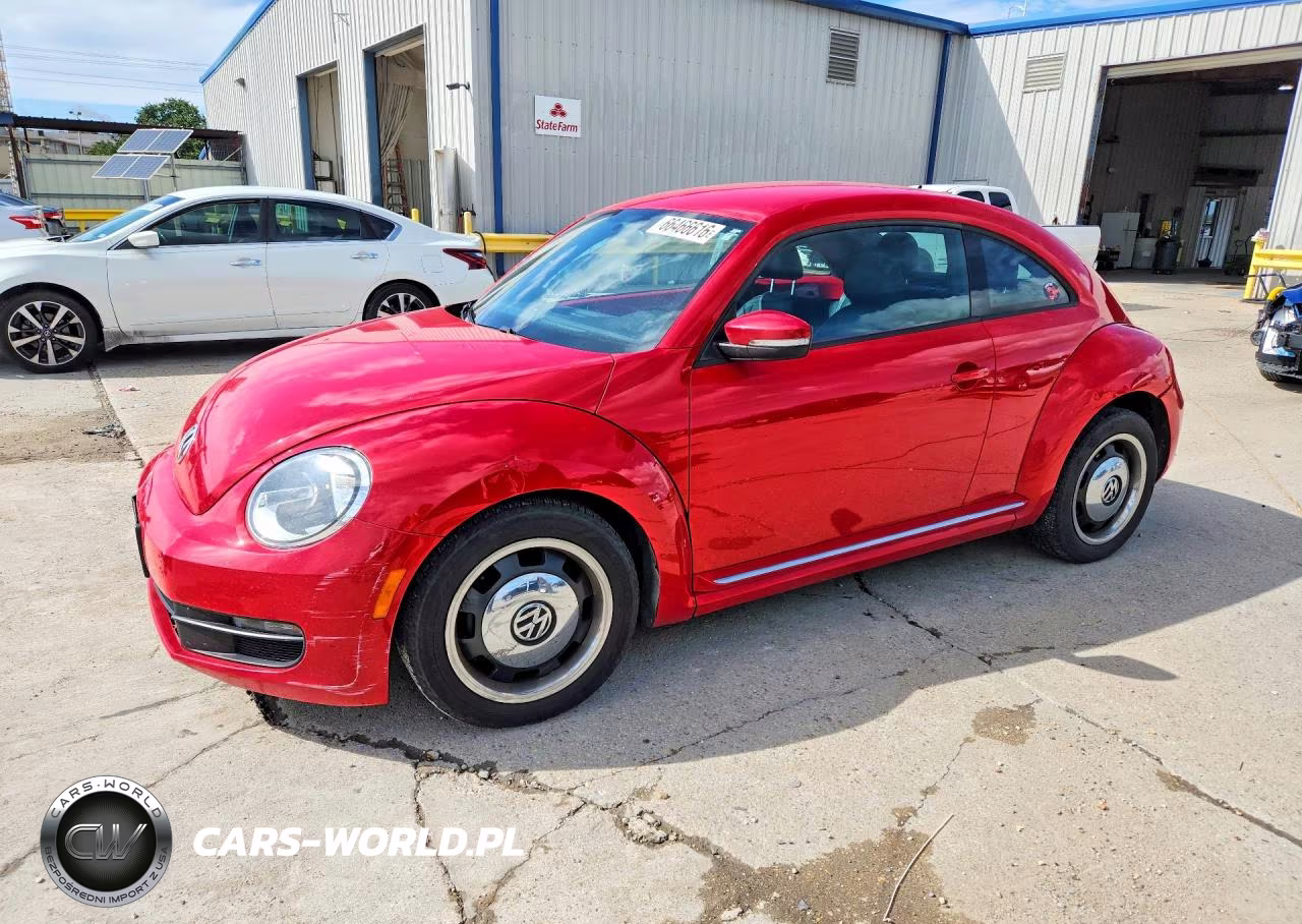 2012 Volkswagen Beetle VIN:3VWJP7AT5CM601551 - 1