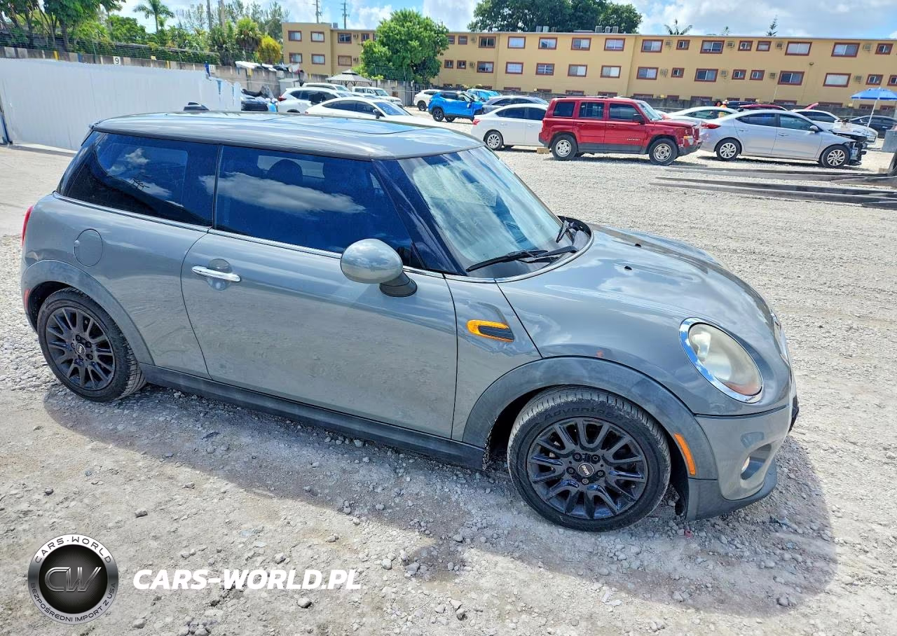 2015 Mini Cooper VIN:WMWXM5C56FT938581 - 4