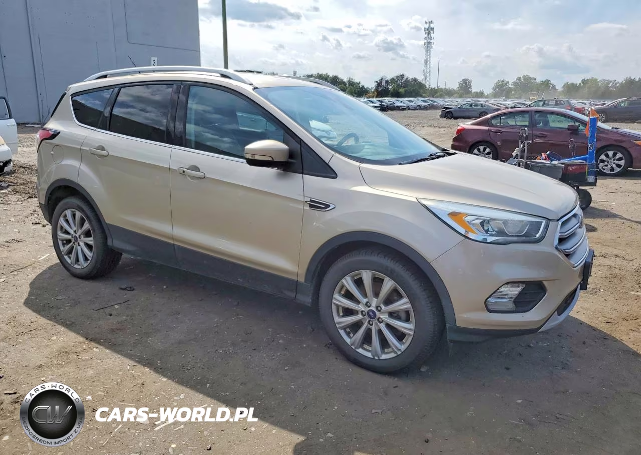 2017 Ford Escape Titanium VIN:1FMCU9J90HUC07796 - 4