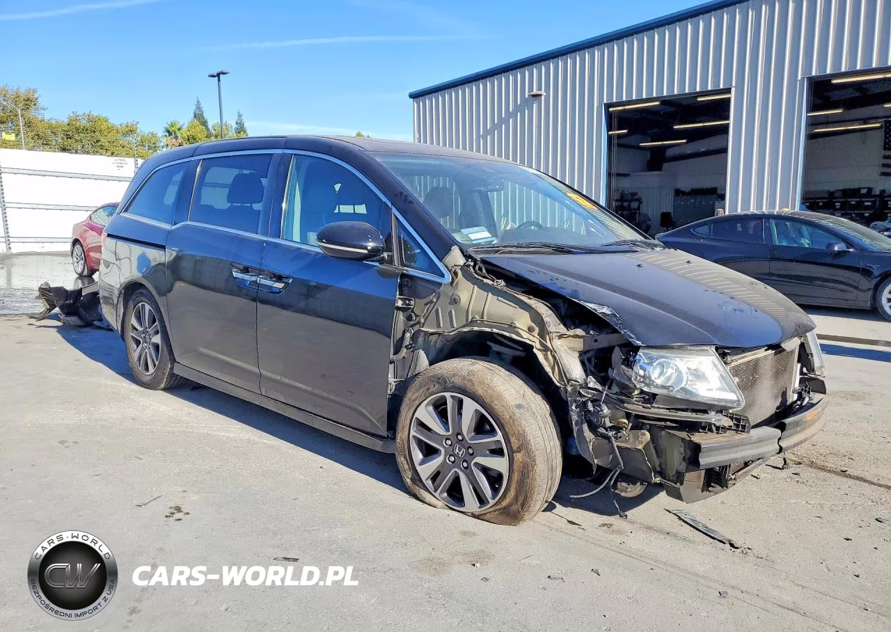 2014 Honda Odyssey Touring VIN:5FNRL5H99EB024286 - 4